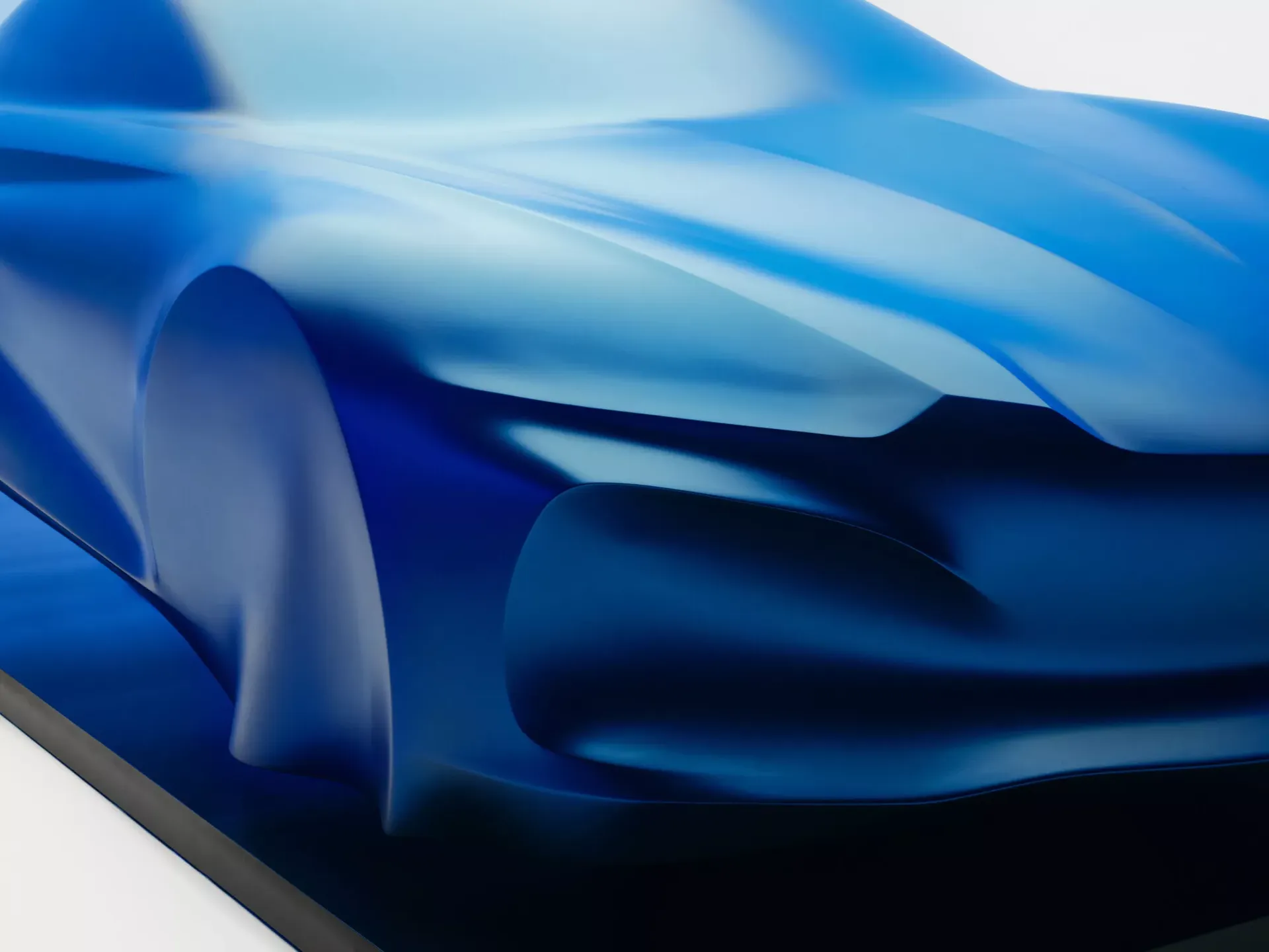 Alpine A110 — rzeźba, detal, przód/bok, ciemne tło