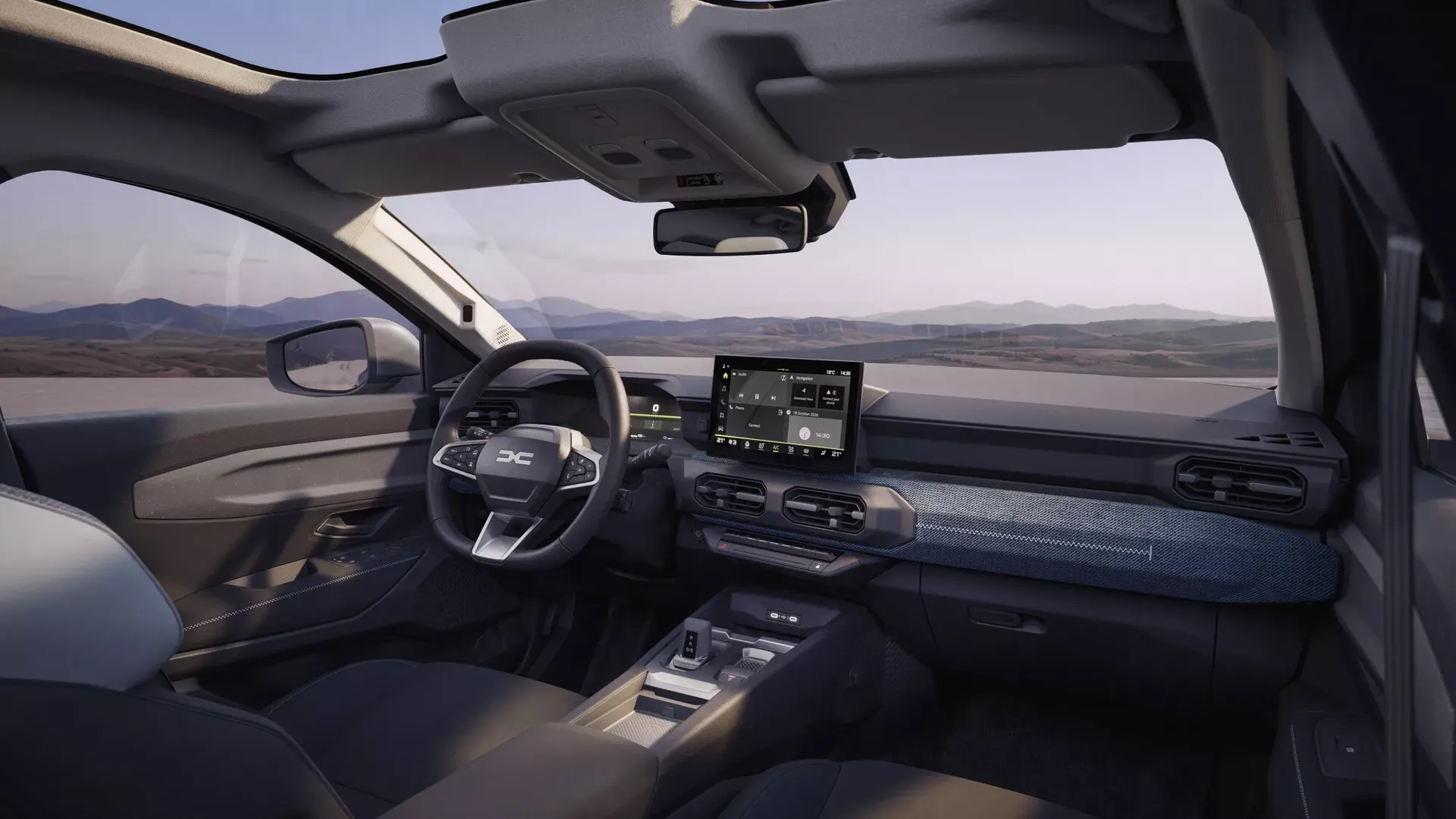 Dacia Striker — wnętrze, widok na kierownicę po lewej stronie i ekran multimedialny