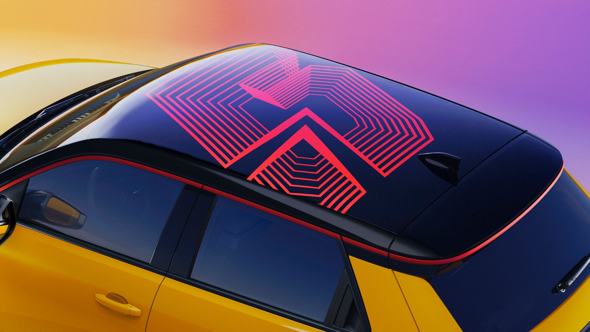Renault 5 E-Tech — detal dachu z czerwono-czarną grafiką numberR5